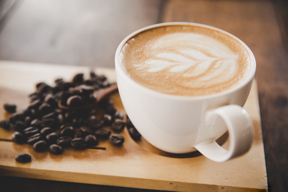Cup of unsweetened premix coffee on wood table in coffee shop cafe in Malaysia